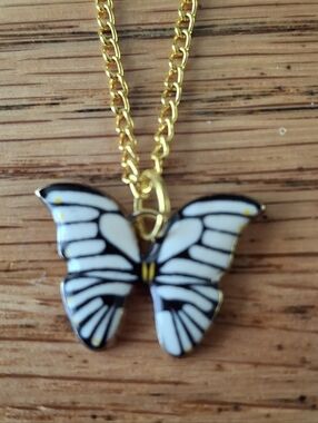 NWT Gold Chain Necklace with White and Black Butterfly Pendant